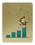 Businessman juggling with money raised on top of a bar graph