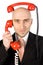 Businessman Juggling Two Calls