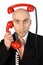 Businessman Juggling Two Calls