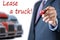 Businessman leasing a new truck to driver / company