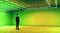 Businessman looking at copyspace light green wall