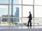 Businessman Looking Out Of Office Window