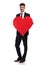 Businessman in love holds a big red heart