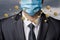 Businessman in a mask protected from viruses