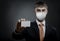 Businessman in medical mask show credit card