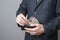 Businessman with money in purse in hands