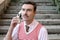 Businessman with a mustache using vintage walkie talkie