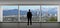 Businessman in an office looking at the view of downtown Los Angeles