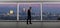 Businessman in an office looking at the view of downtown Los Angeles