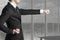 Businessman in office punch karate pose