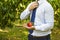 Businessman with peach in his hand