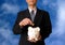 Businessman With Piggy Bank