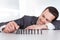 Businessman playing domino