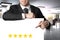 Businessman pointing on blank banner with five golden stars advertising 3d illustration