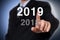 Businessman pointing year 2019. Businessman new year concept.