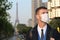 Businessman with pollution mask in Paris