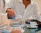 Businessman pours water