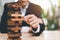 Businessman pulling a jenga wooden box,financial risk management and strategic planning,through data analysis for continuous