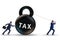 Businessman pulling kettlebell in tax concept