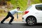 Businessman, push car or breakdown on road engine fail, emergency tyre or auto service. Male person, work transport and