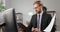 Businessman reading documents at office