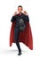 A businessman in a red superhero cape kicking an invisible object on white background.