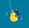 Businessman riding a light bulb flying in the sky, creative concepts