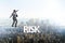 The businessman in risk concept walking on tight rope