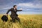 Businessman running in a field