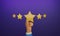 Businessman`s hand holding a yellow star placed in the middle of 5 stars on purple background