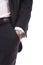 Businessman\'s hand in the pocket with wristwatch.