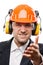 Businessman in safety hardhat helmet gesturing hand greeting or