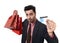 Businessman in Santa Claus Christmas hat holding sopping bags and credit card in worried and stress