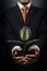 Businessman with scion rubber plant