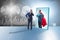 Businessman seeing himself in mirror as superhero