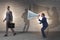 Businessman shouting through large loudspeaker