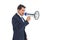 Businessman shouting with a megaphone