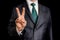 Businessman showing gesture victory with two fingers