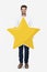 Businessman showing golden star rating symbol