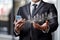 A businessman shows in his hands a hologram of human resources