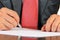 Businessman sign documents close-up