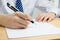 Businessman signing documents