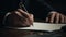 Businessman signs documents with a pen making the signature