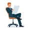 Businessman sitting in chair holding newspaper in hands and reading.