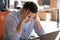 Businessman sitting at desk near computer having problems feels stressed