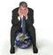 Businessman sitting on a globe