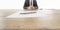 Businessman sitting at his wooden office desk with contract infr