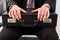 Businessman sitting and holding briefcase