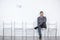 Businessman sitting and waiting for interview in office