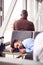 Businessman Sleeping On Seats In Airport Departure Lounge Because Of Delay